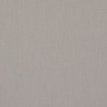 Linen-textured beige fabric panel fills the frame, lying flat and unwrinkled; soft, even lighting reveals a subtle woven pattern across the surface.