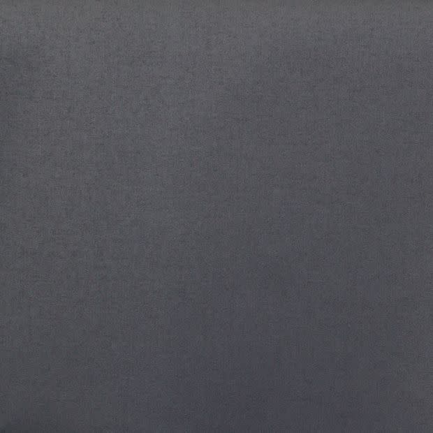 Dark grey, finely textured fabric fills the frame; lying flat and uniformly lit; no surrounding objects or depth visible, showing subtle tonal variation across a neutral surface.