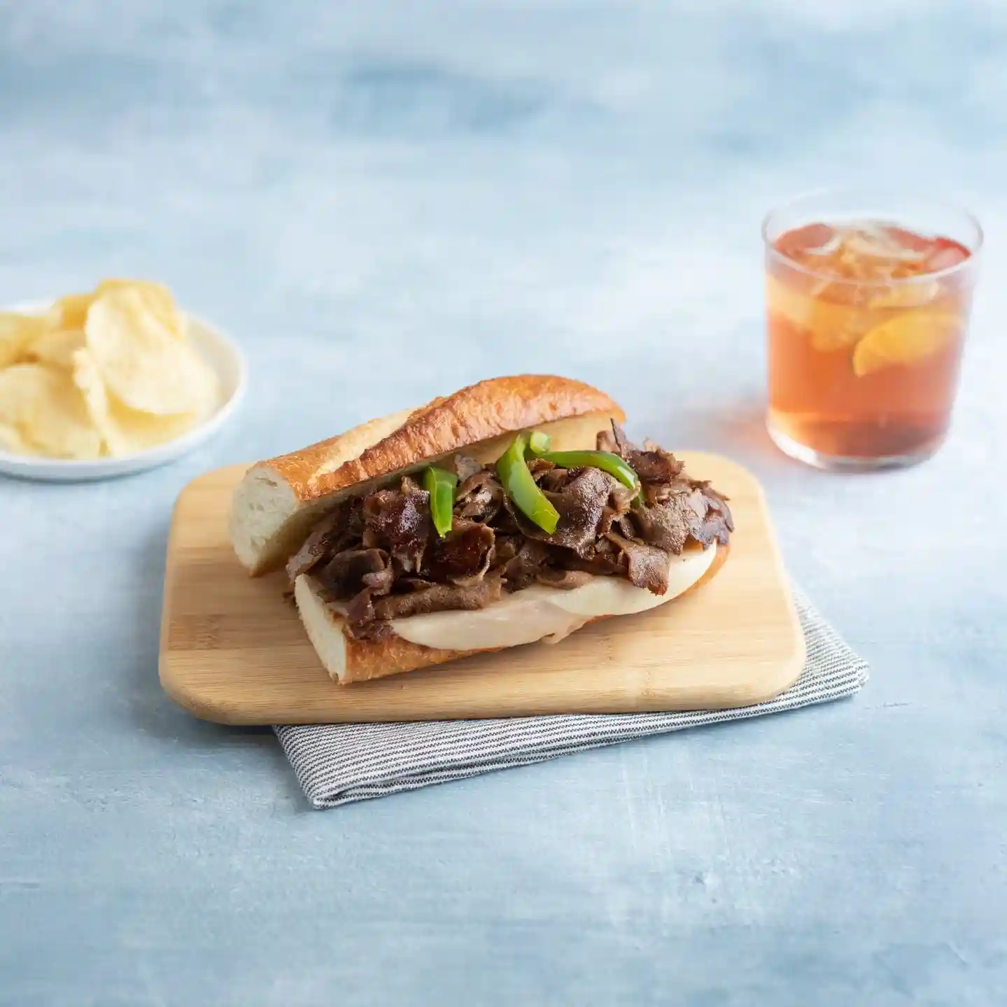 Philly Freedom® Traditional Beef Flat Steak Slices, Marinated with Food Starch, 6 oz https://images.salsify.com/image/upload/s--s1QMlST0--/q_25/z6jgdqp0g8ftfcypek4p.webp