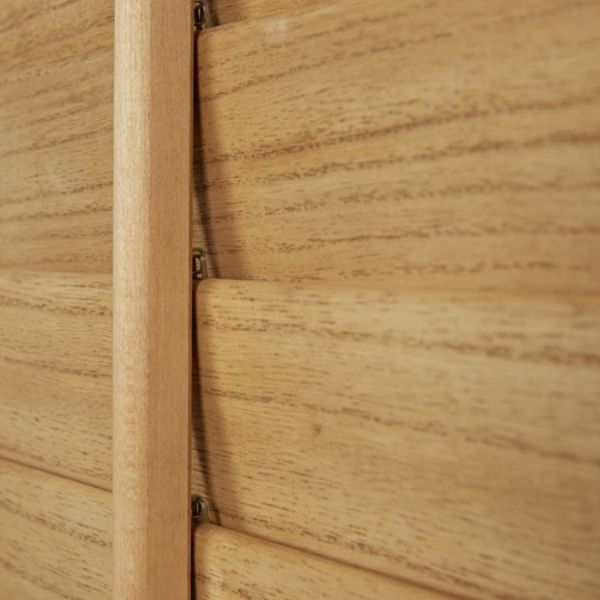 Wooden plantation shutters with a central vertical tilt rod and overlapping horizontal slats — closed, aligned to block light — close-up interior view showing warm wood grain and soft ambient light.