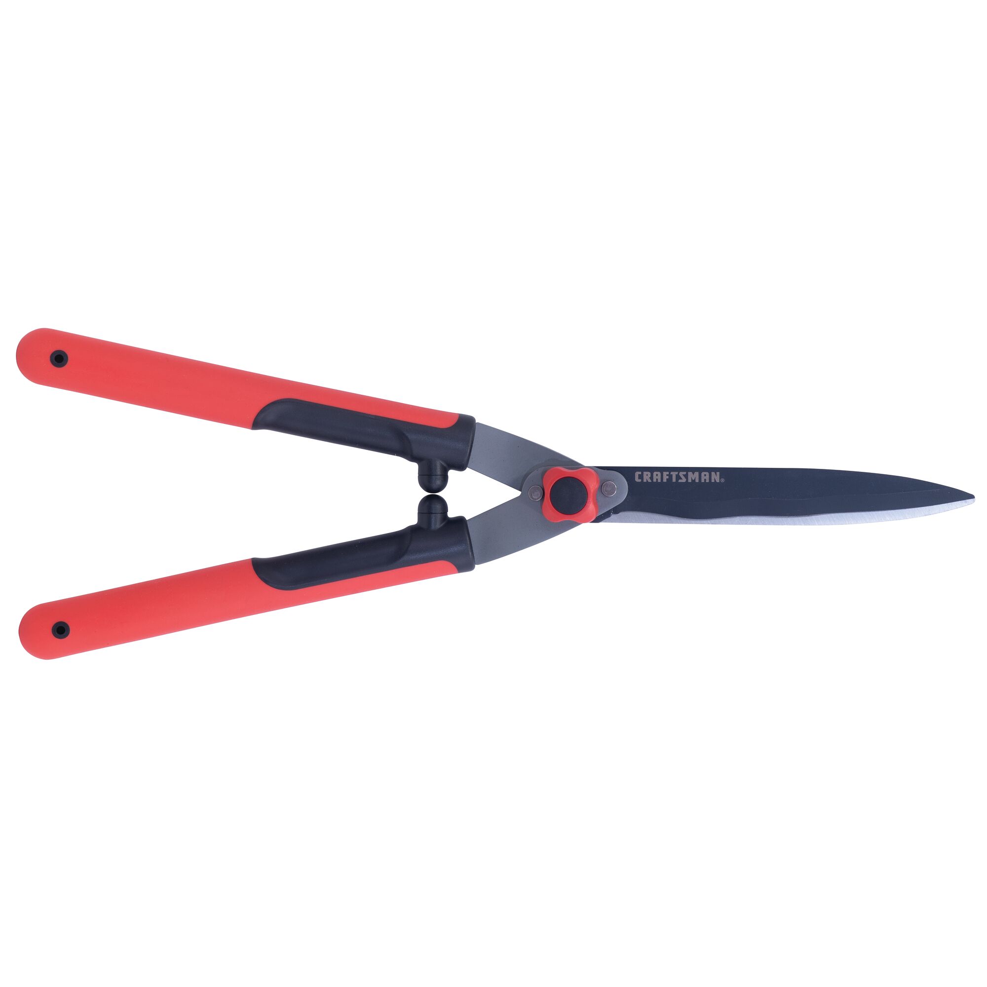Hedge shears with closed blades.