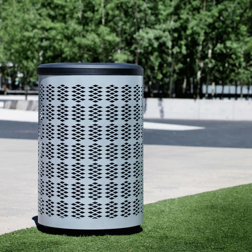 durable steel outdoor trash container with a black plastic canopy lid outdoors on a city sidewalk