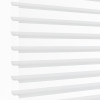 White horizontal sheer zebra blinds mounted over a window, alternating opaque and translucent bands; partially closed, filtering bright daylight into a minimal, evenly lit interior.