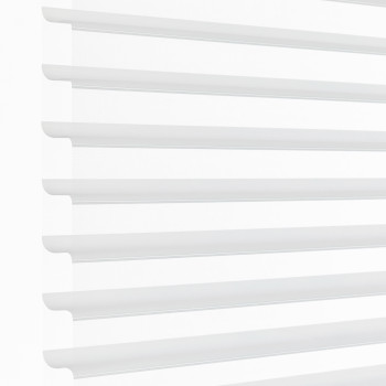 White horizontal sheer zebra blinds mounted over a window, alternating opaque and translucent bands; partially closed, filtering bright daylight into a minimal, evenly lit interior.