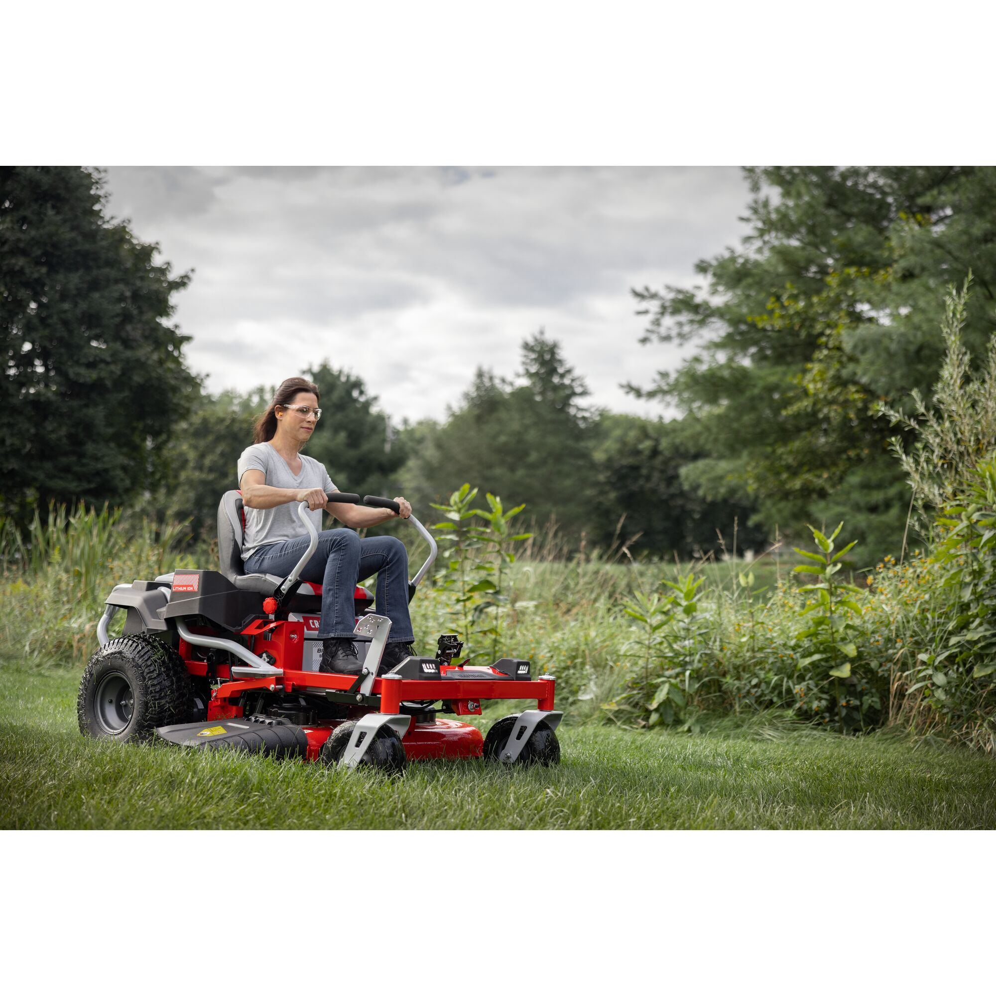 CRAFTSMAN Battery-Powered Zero-Turn Mower mowing grass area near field