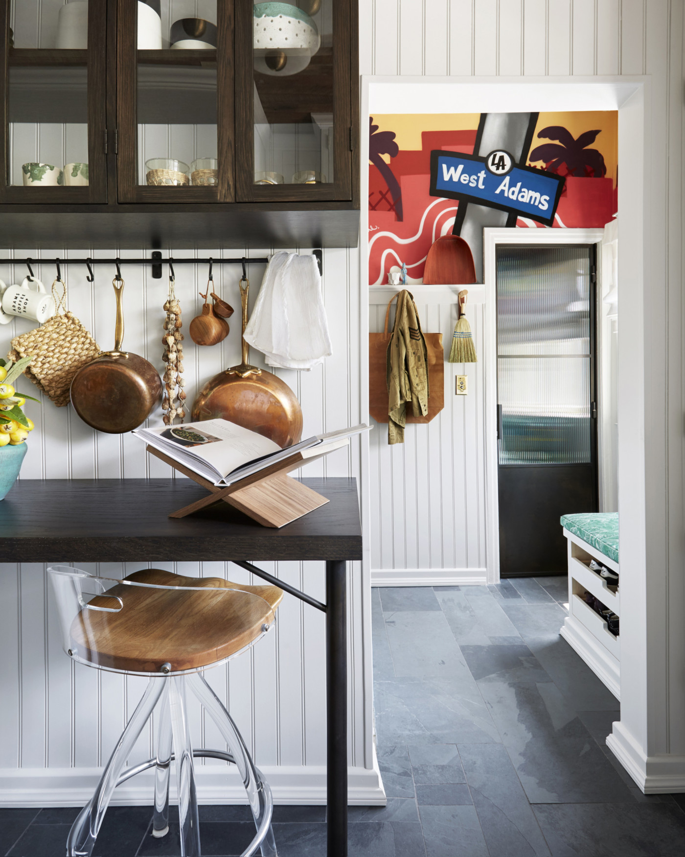 a kitchen with a table and chairs.