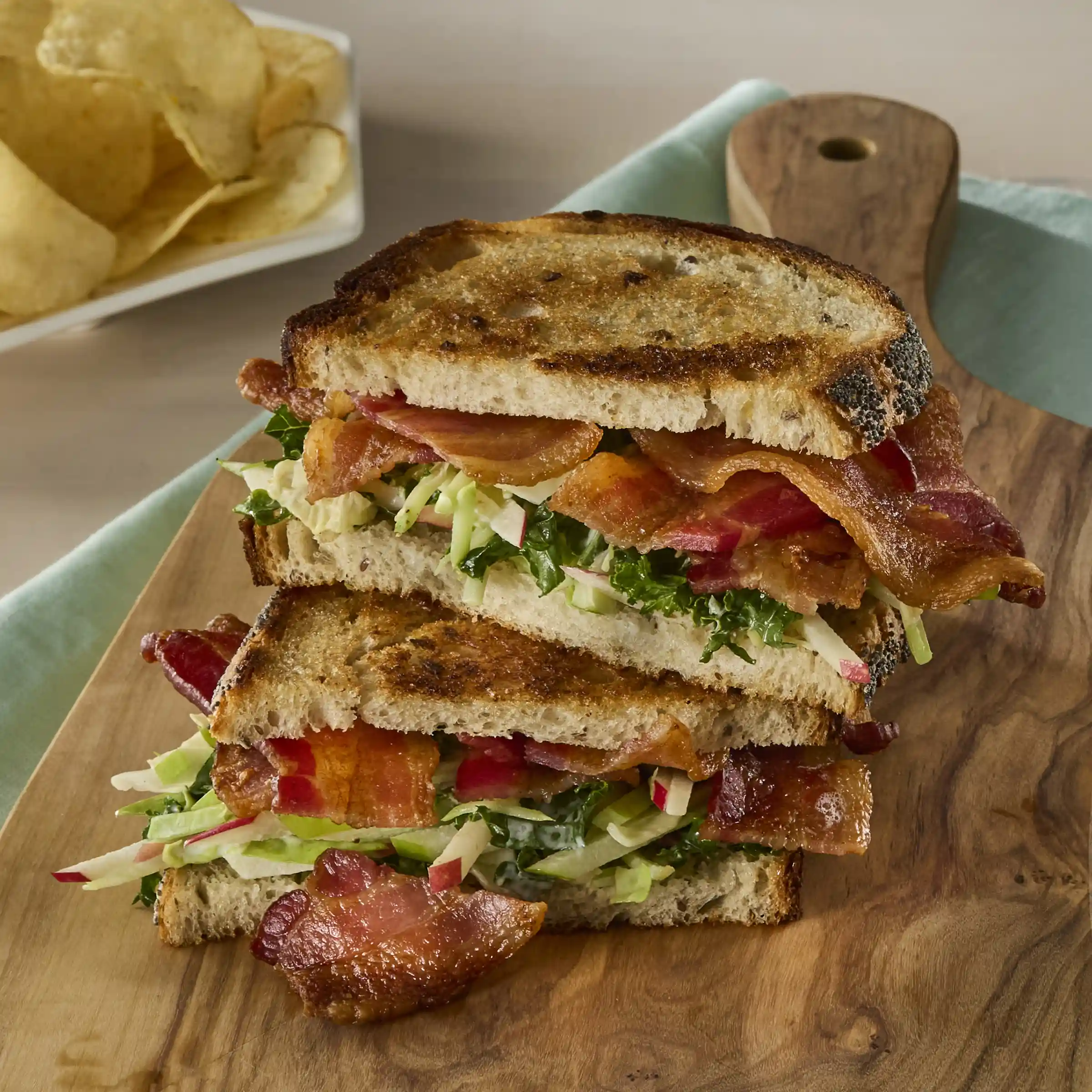 Wright® Brand Naturally Applewood Smoked Thick Sliced Bacon, Bulk, 10-14 Slices per Pound, Gas Flushed https://images.salsify.com/image/upload/s--ClNAK4g7--/q_25/200fa06133a9662abc3b5f299ba4363f777a1a35.webp