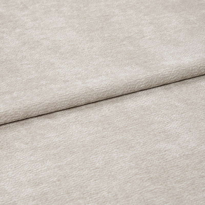 Beige textured fabric, folded with a horizontal overlap; soft, slightly napped surface; close-up, evenly lit view of neutral upholstery or drapery textile.