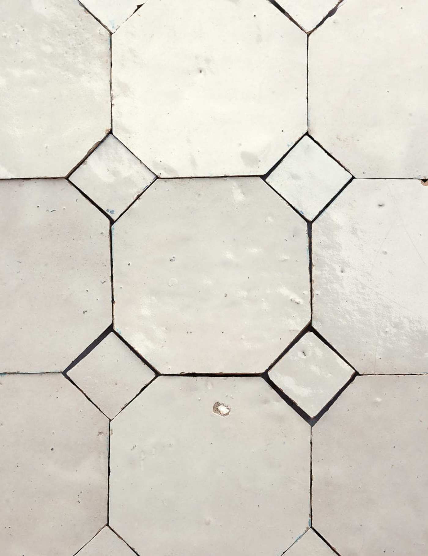 white tiles arranged in a pattern.