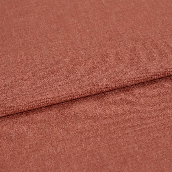 Woven terracotta textile, folded with an overlapping crease, displayed in a well-lit close-up emphasizing its fine, slightly heathered weave and flat, smooth surface.