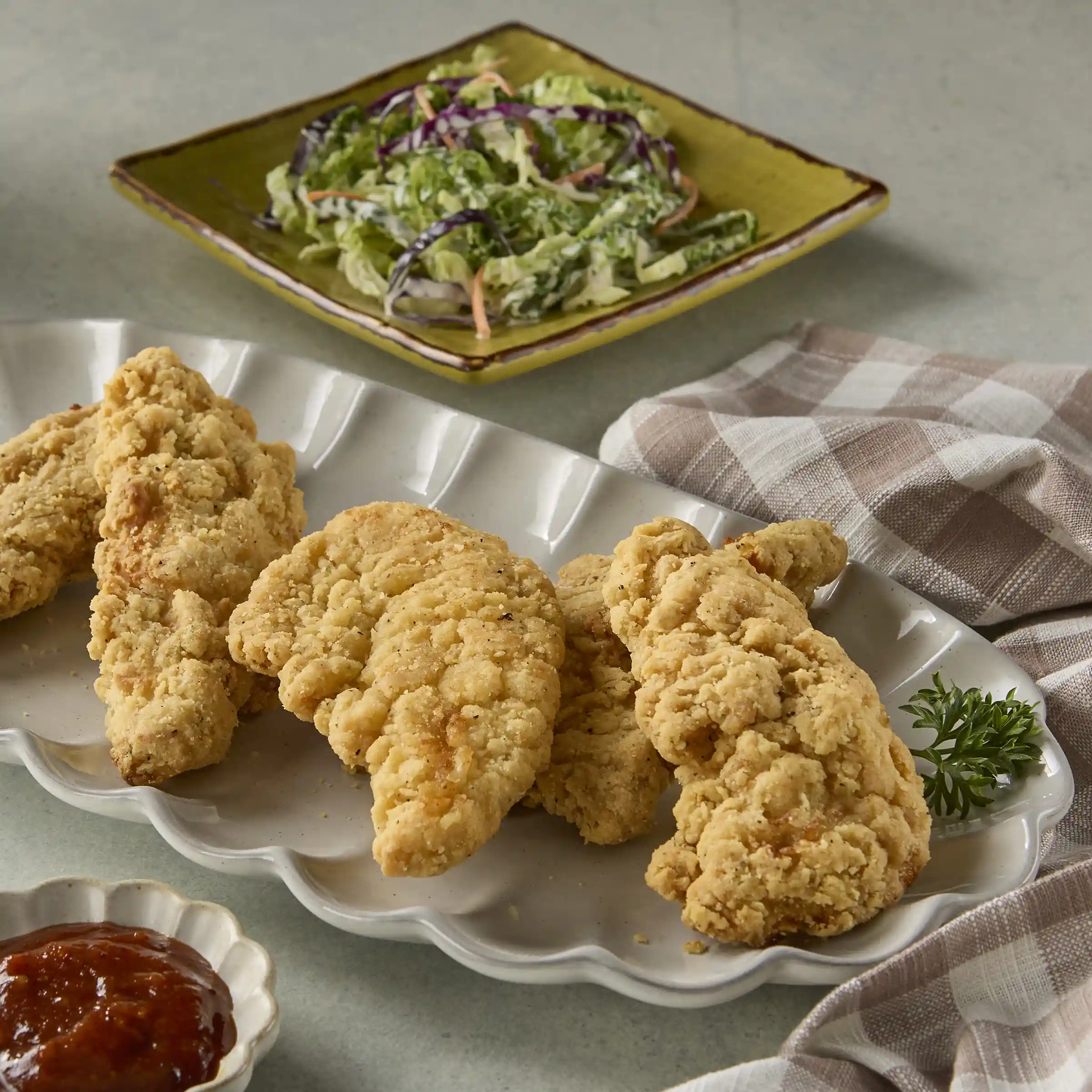 Tyson Red Label® Uncooked Authentically Crispy Original Chicken Tenderloin Fritters https://images.salsify.com/image/upload/s--TpN1GMn1--/q_25/ea2a244801b1fa19e224df95ff503df60da88539.webp