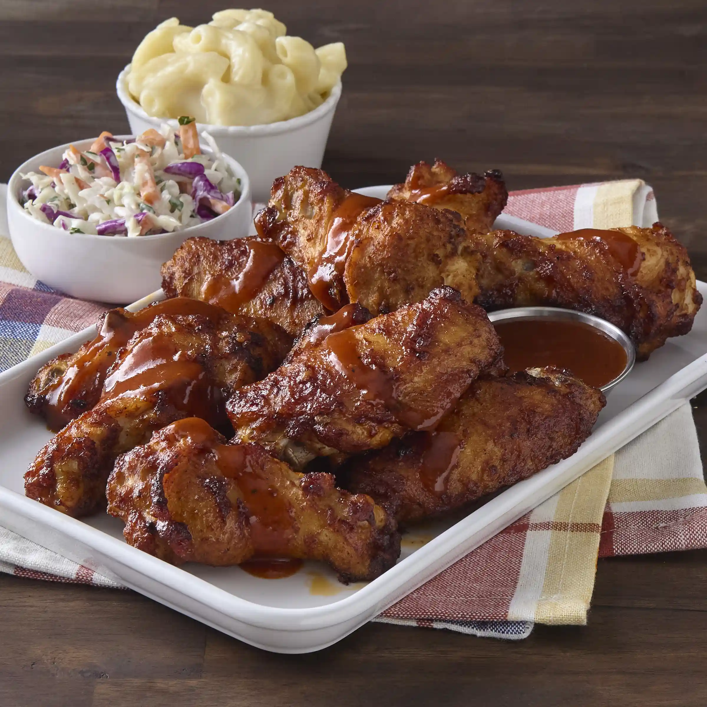 Tyson® Fully Cooked BBQ Glazed Bone-In Chicken Wing Sections, Jumbohttps://images.salsify.com/image/upload/s--osnYIaQE--/q_25/ipysq3rpfr8axazyna3x.webp