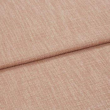 Blush-pink woven fabric folded over itself, showing a coarse textured weave; close-up studio view with soft, even lighting highlighting fibers.