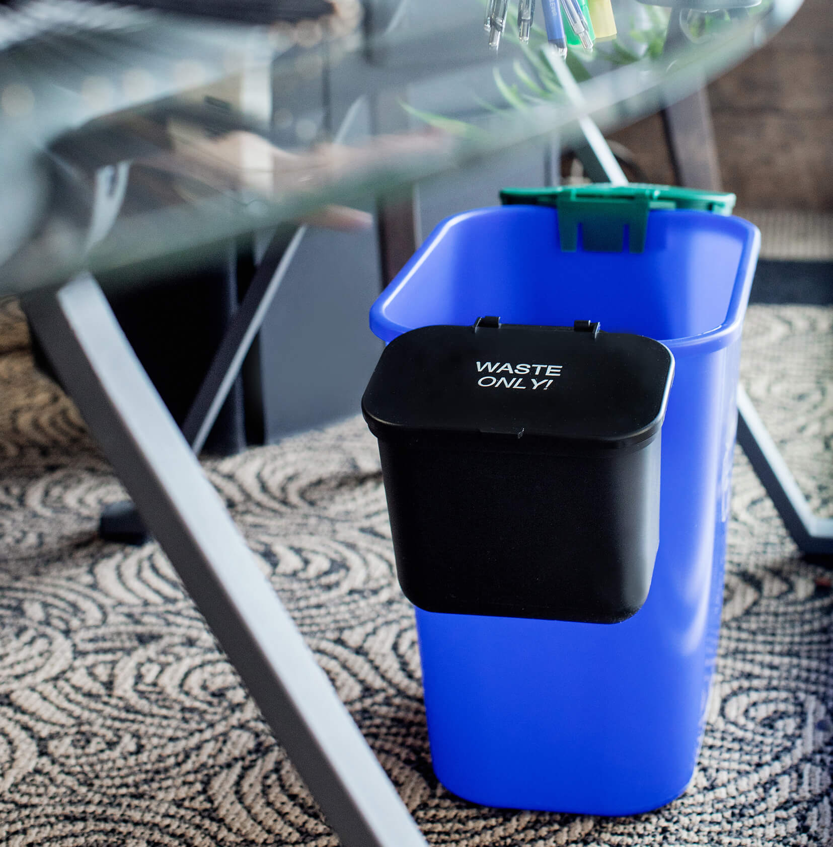 small hanging trash bin and hanging organics bin for the sides of a larger recycling bin in a modern office