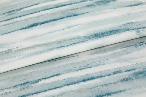 A folded piece of fabric with Mist Aqua Teal printed on it