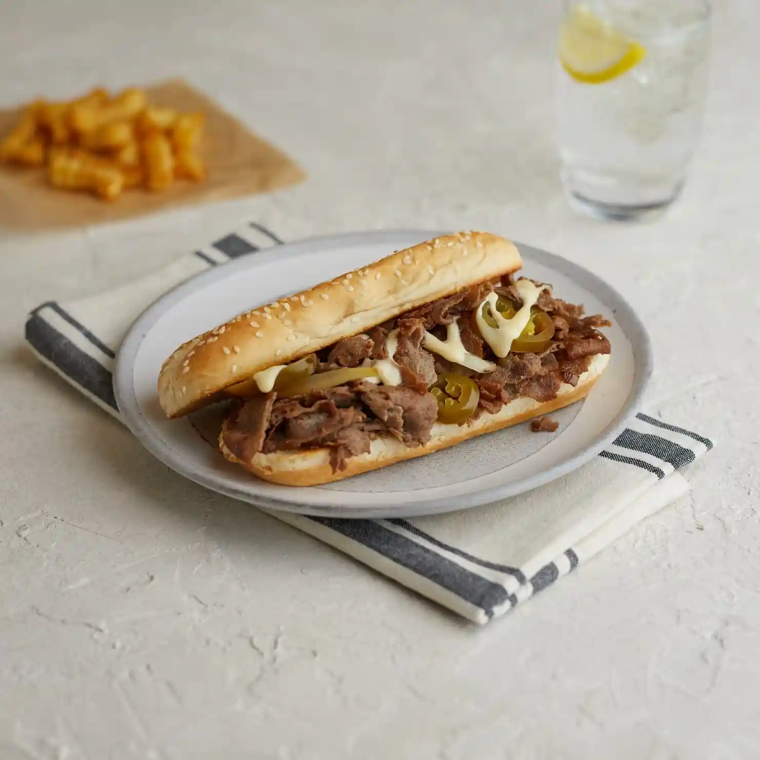 Minuteman™ Traditional Beef Flat Steak Slices, Marinated with Food Starch, 4 oz https://images.salsify.com/image/upload/s--rqTnfWgK--/q_25/gwmtk8iek5bltvvfjxko.webp