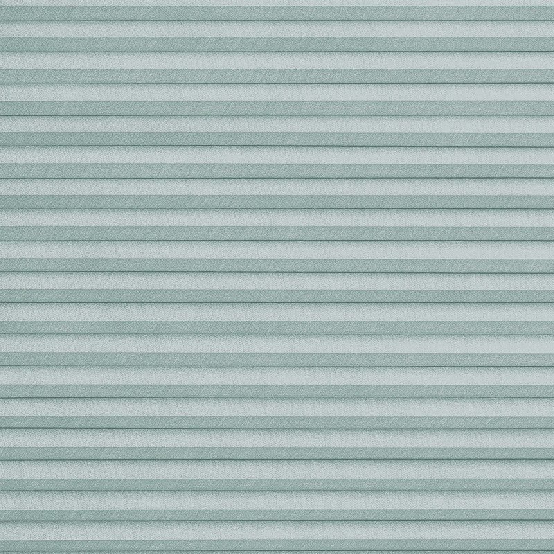 Horizontal pleated cellular blinds with pale teal and light-blue bands, fully closed and softly filtering light, filling the frame as a close-up of a window covering in diffuse daylight.