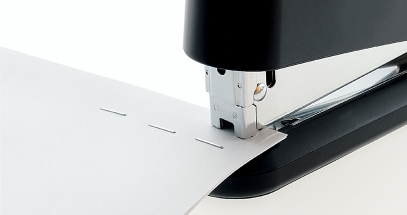 The Dual Staple Guide provides even pressure for smooth, uniform stapling.