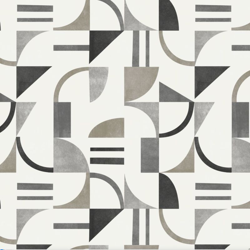 Geometric wallpaper of semicircles, triangles, rectangles and parallel bars in muted gray, taupe and black, arranged in a repeating tessellated pattern on a flat white surface under even lighting.