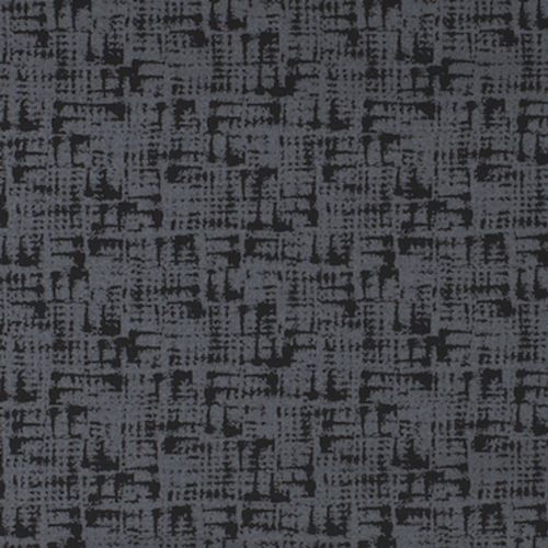 Patterned dark-gray carpet with irregular black crosshatch texture — covering a flat floor surface — in a dimly lit indoor setting, appearing uniform and tightly woven.