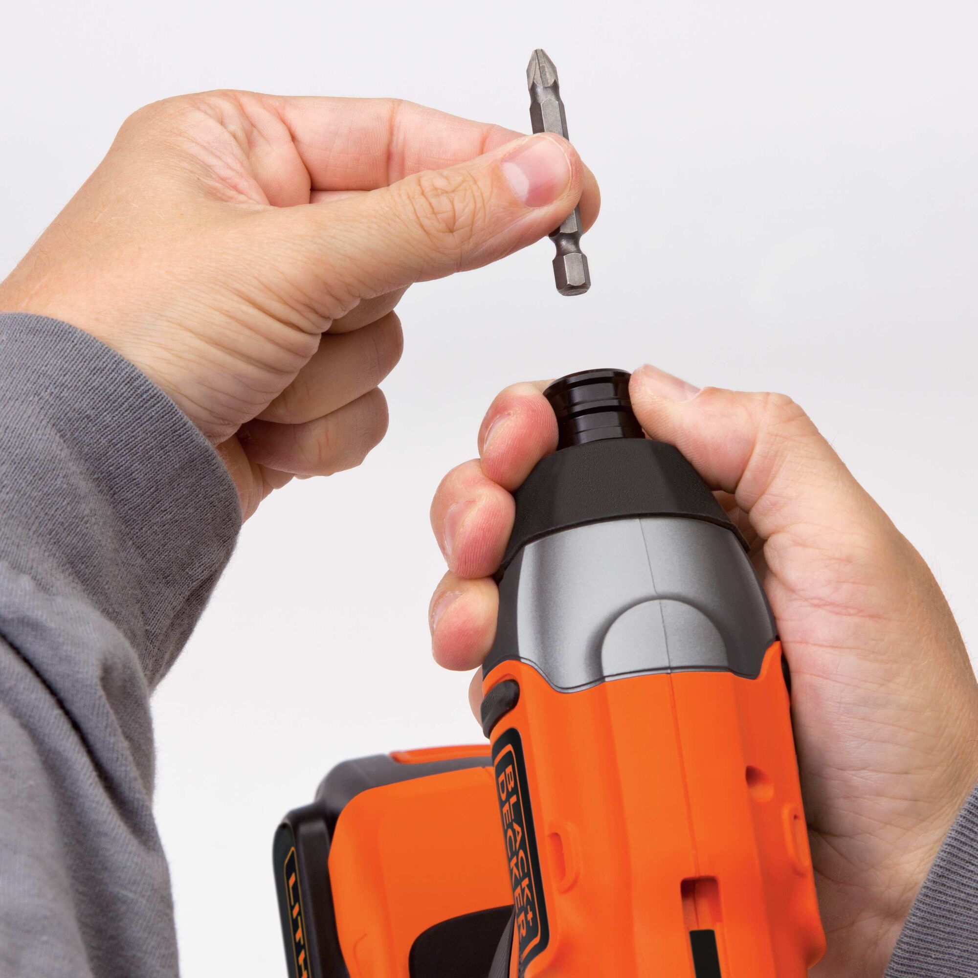 Quick release one quarter inch hex chuck feature of MAX Lithium Impact Driver.