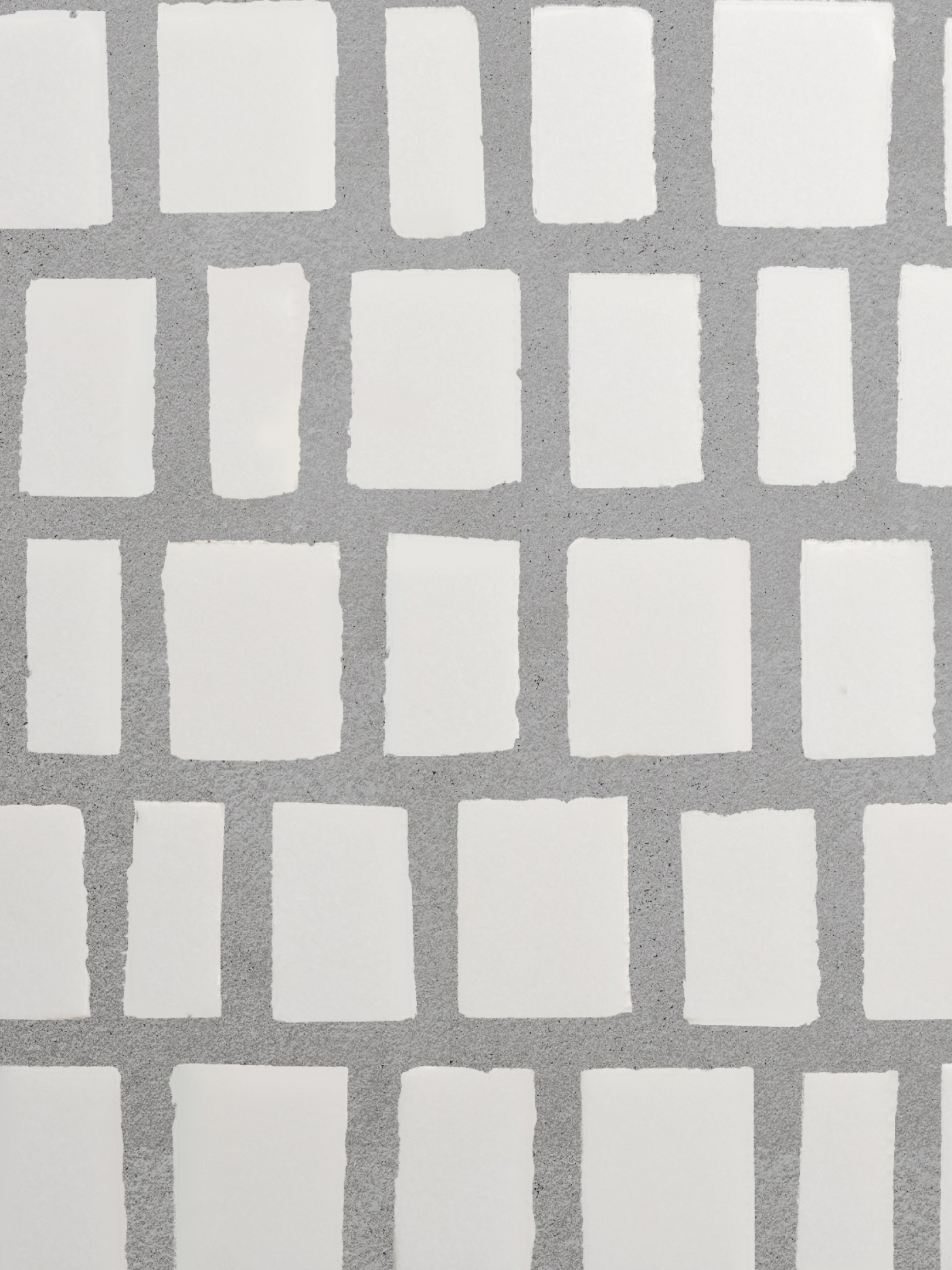 a white tile with white squares on it.