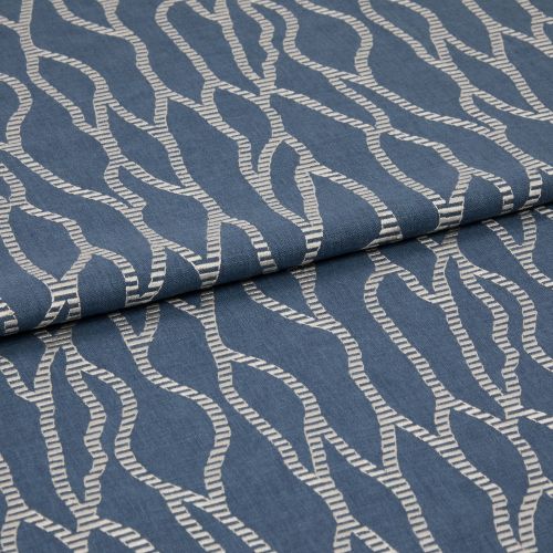 Blue woven fabric with cream embroidered wavy rope pattern, folded over itself, shown in a close-up studio view with soft, even lighting.