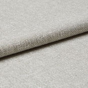 Beige woven fabric swatch, folded and layered, showing coarse basket-weave texture and subtle sheen; photographed in close-up with neutral lighting on a flat surface.