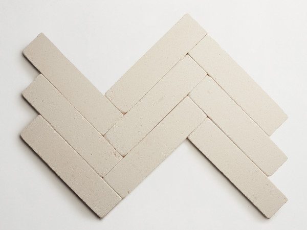 lapidary: girata | blade | white limestone | tumbled 