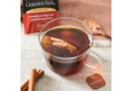 Lifestyle image of a cup of Bigelow Cinnamon Stick Tea