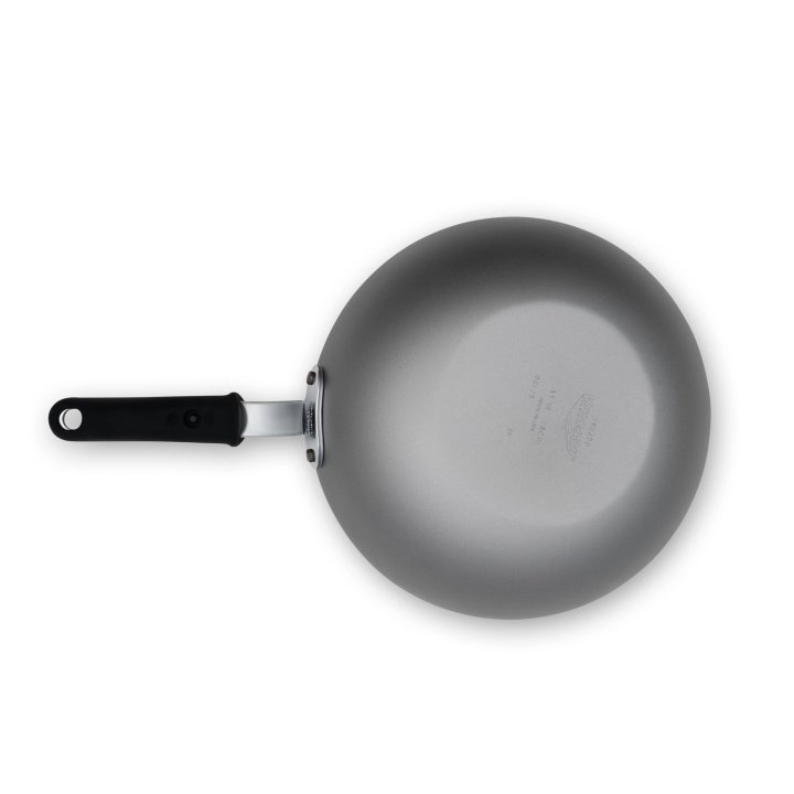 11-inch carbon steel induction stir-fry pan with SteelCoat x3™ nonstick coating and silicone handle