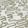 White linen-like fabric with olive-green meandering rectangular print, folded in layers, shown as a close-up textile sample on a neutral background under soft, even studio lighting.