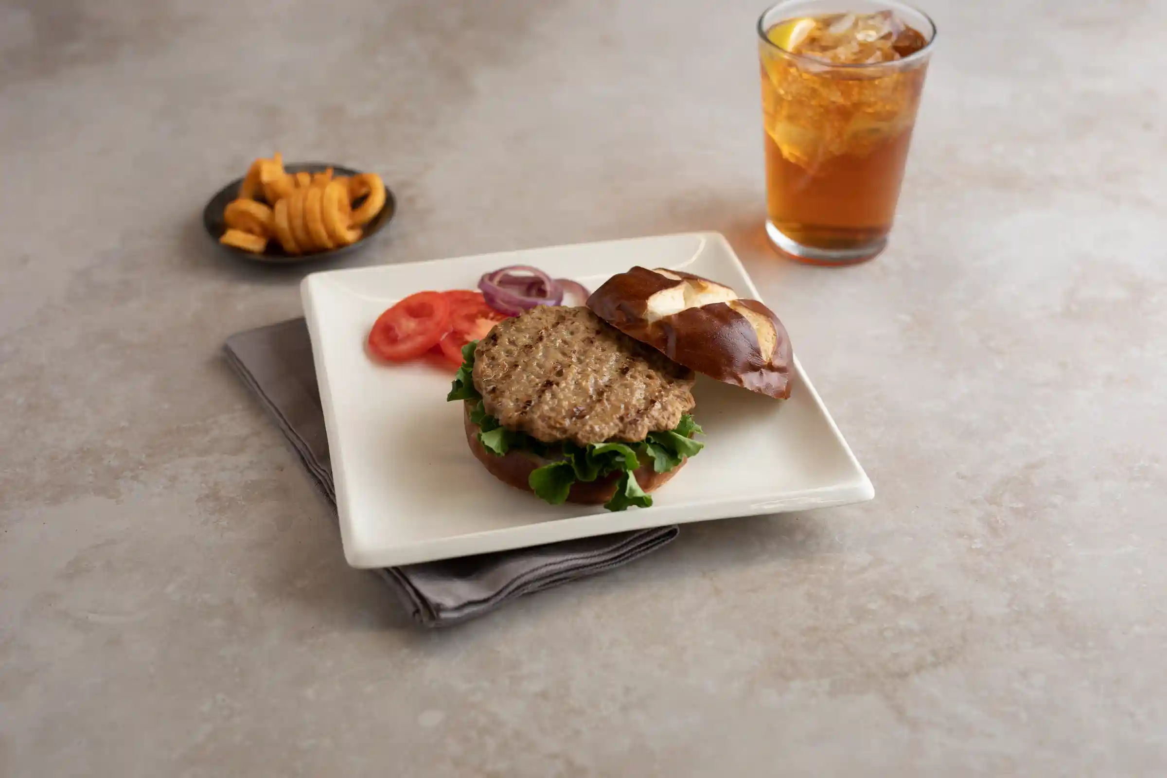 Tenderbroil® Flame Grilled Beef Patties, 2.70 oz. https://images.salsify.com/image/upload/s--TG9KJr8y--/q_25/h7ufrkn6at6ewlsa0lhr.webp
