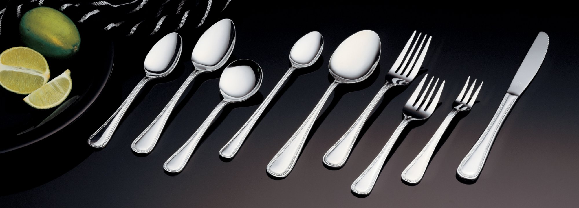 7 ⅜-inch brocade stainless steel dessert spoon