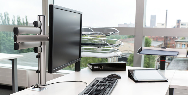 Commercial Offices Space-saving monitor arms lift viewing devices off the desktop to enhance viewing comfort and improve productivity.