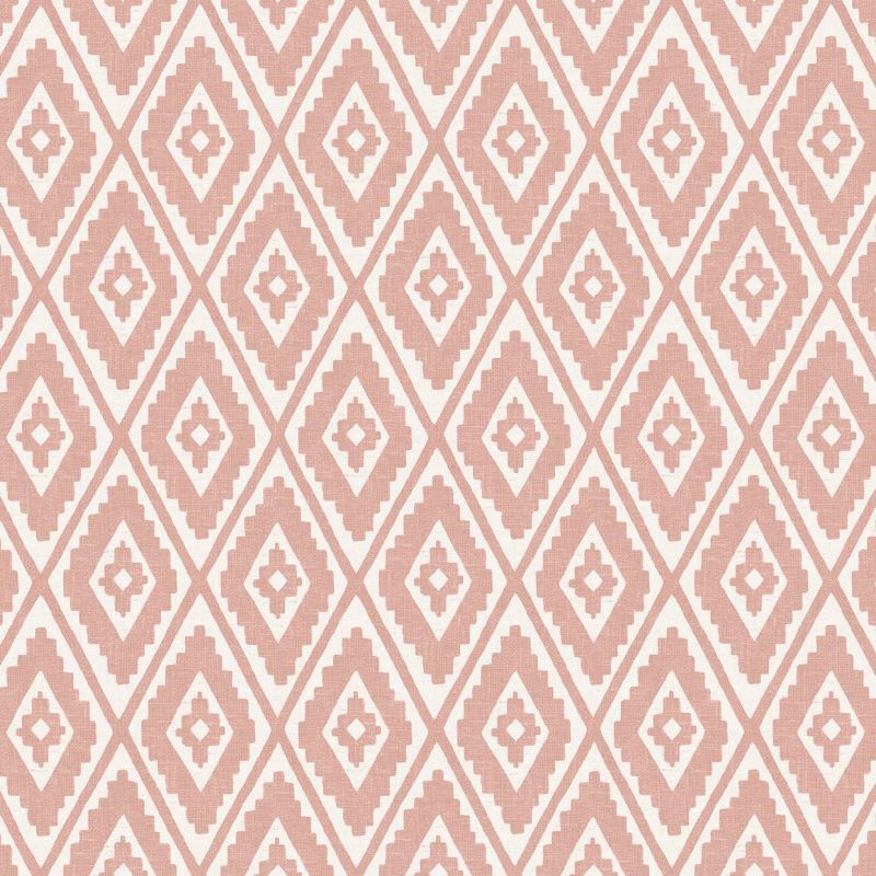Dusty-pink and white diamond-patterned wallpaper, stepped-edge motifs repeating across the surface, covers the entire flat wall, evenly lit close-up with no visible furnishings or windows.