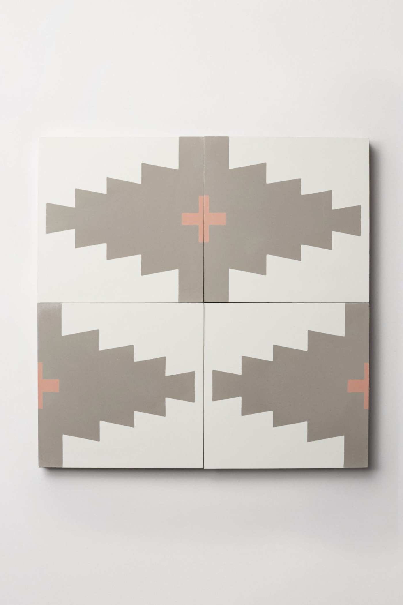 a set of tiles with a geometric pattern on them.