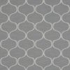 Grey textured wallpaper with overlapping white arabesque trellis pattern; pattern repeats uniformly across the surface; close-up view of a subtle, contemporary interior wall covering.