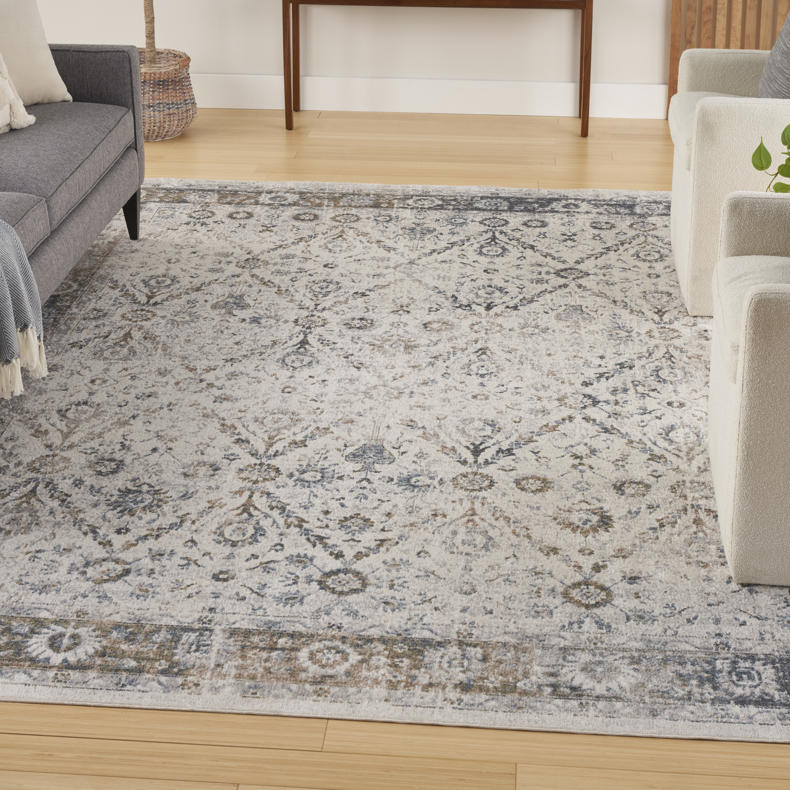 Nourison Astra Machine Washable 6'7" x 9' Ivory Blue Vintage Indoor Rug
