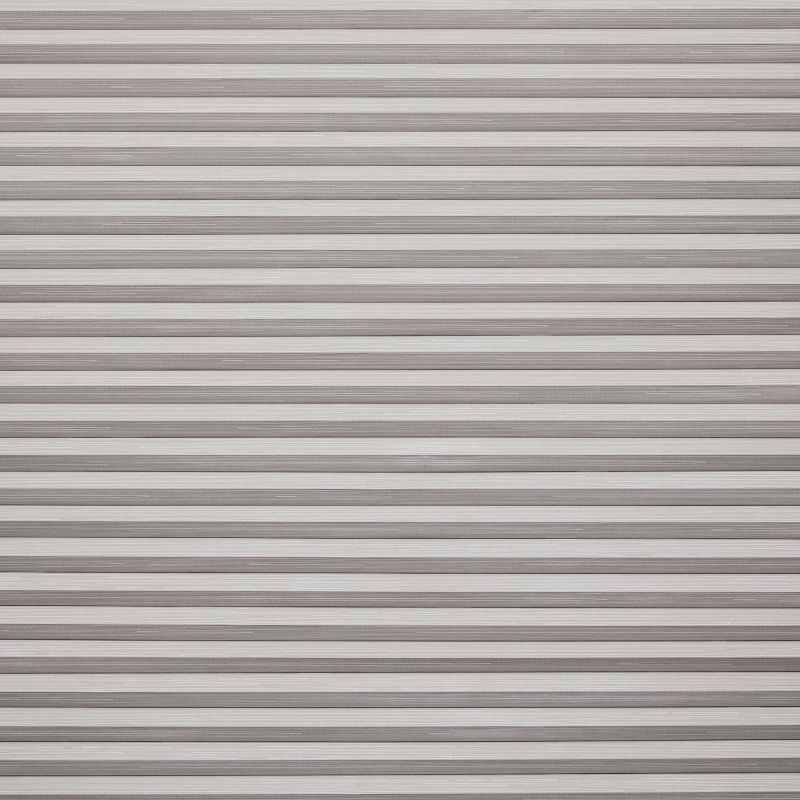 Horizontal slatted roller shutter (narrow, textured beigeâ€‘gray metal slats) â€” fully closed, overlapping â€” blocking light and view across a window or doorway in neutral indoor lighting.