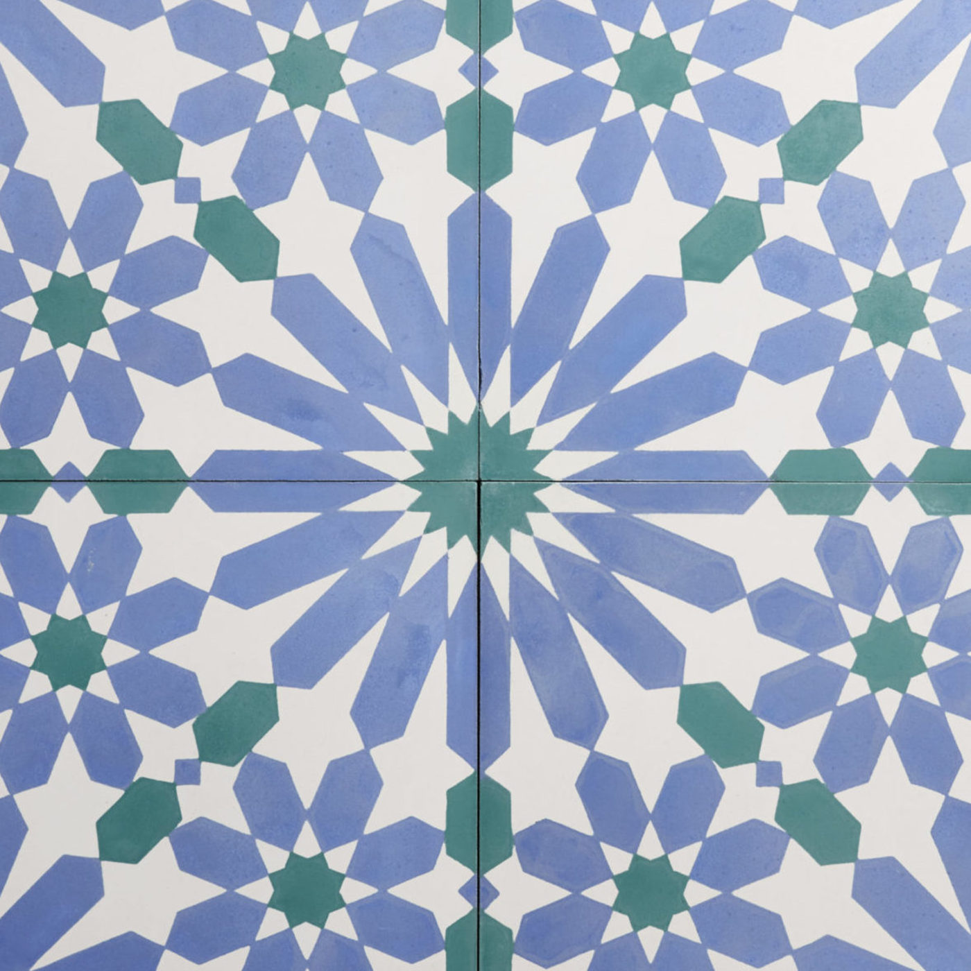 a set of blue, white, and green patterned tiles.