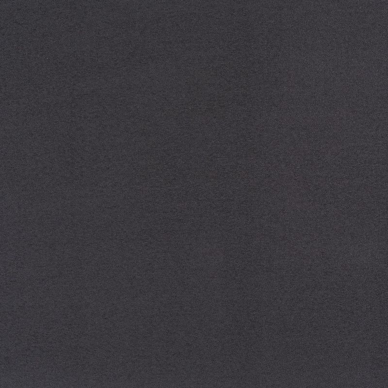 Dark charcoal, finely textured fabric covering the entire frame, showing subtle grain and uniform noise; appearing flat and evenly lit with no visible edges, patterns, or context clues.