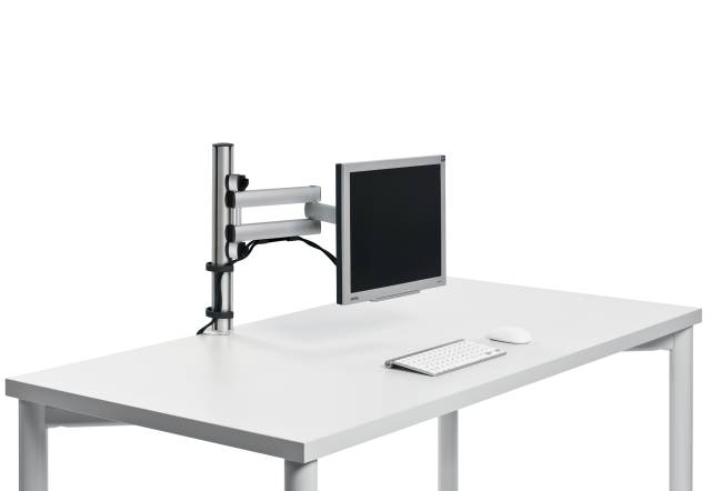 Novus TSS Basic lifts a monitor off the desk maximizing space and ergonomic comfort.