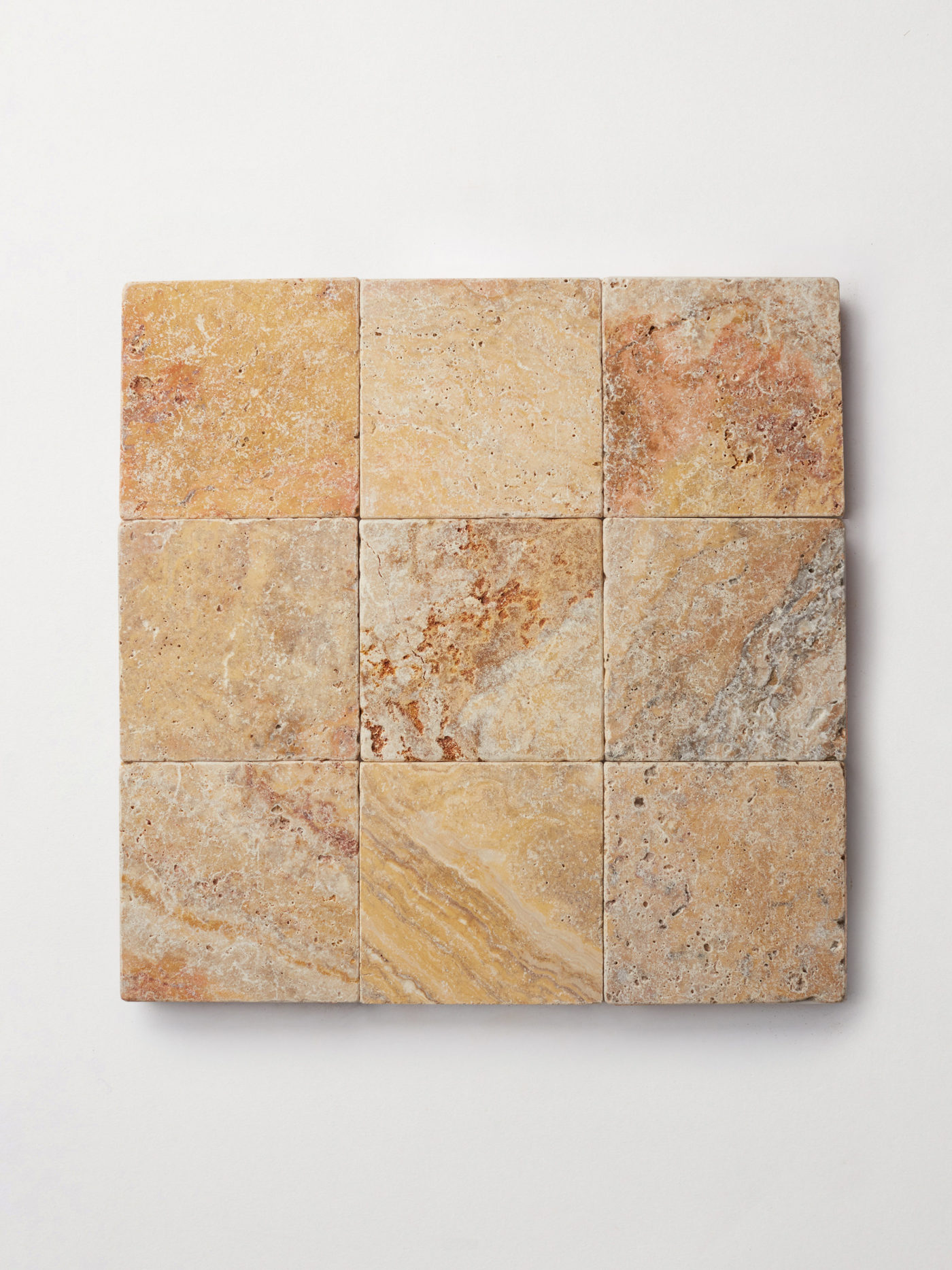 9 square tiles with tan and brown colors on a white background.