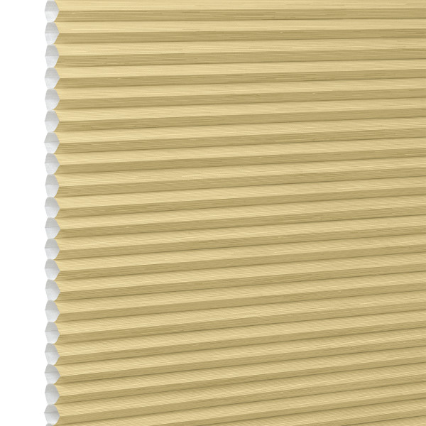 Honeycomb cellular blind, beige with visible hexagonal cells at left edge and narrow horizontal pleats — fully lowered and closed, filtering soft light in a close-up, neutral setting.