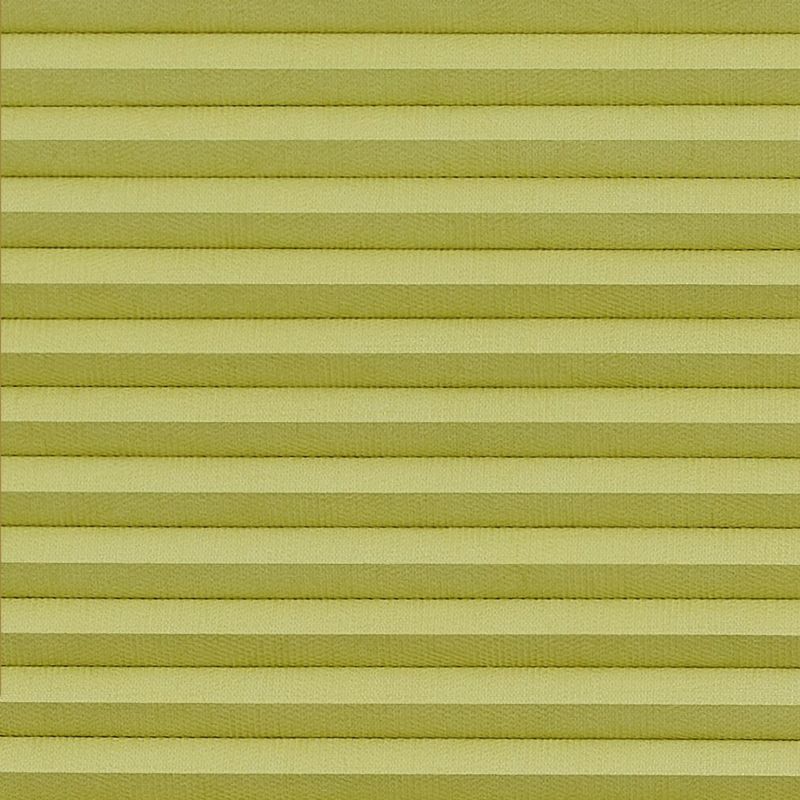 Horizontal pleated blinds (pale yellowâ€‘green), fully lowered and closed with evenly spaced folds, filtering diffuse indoor light and filling the window area; no view visible.
