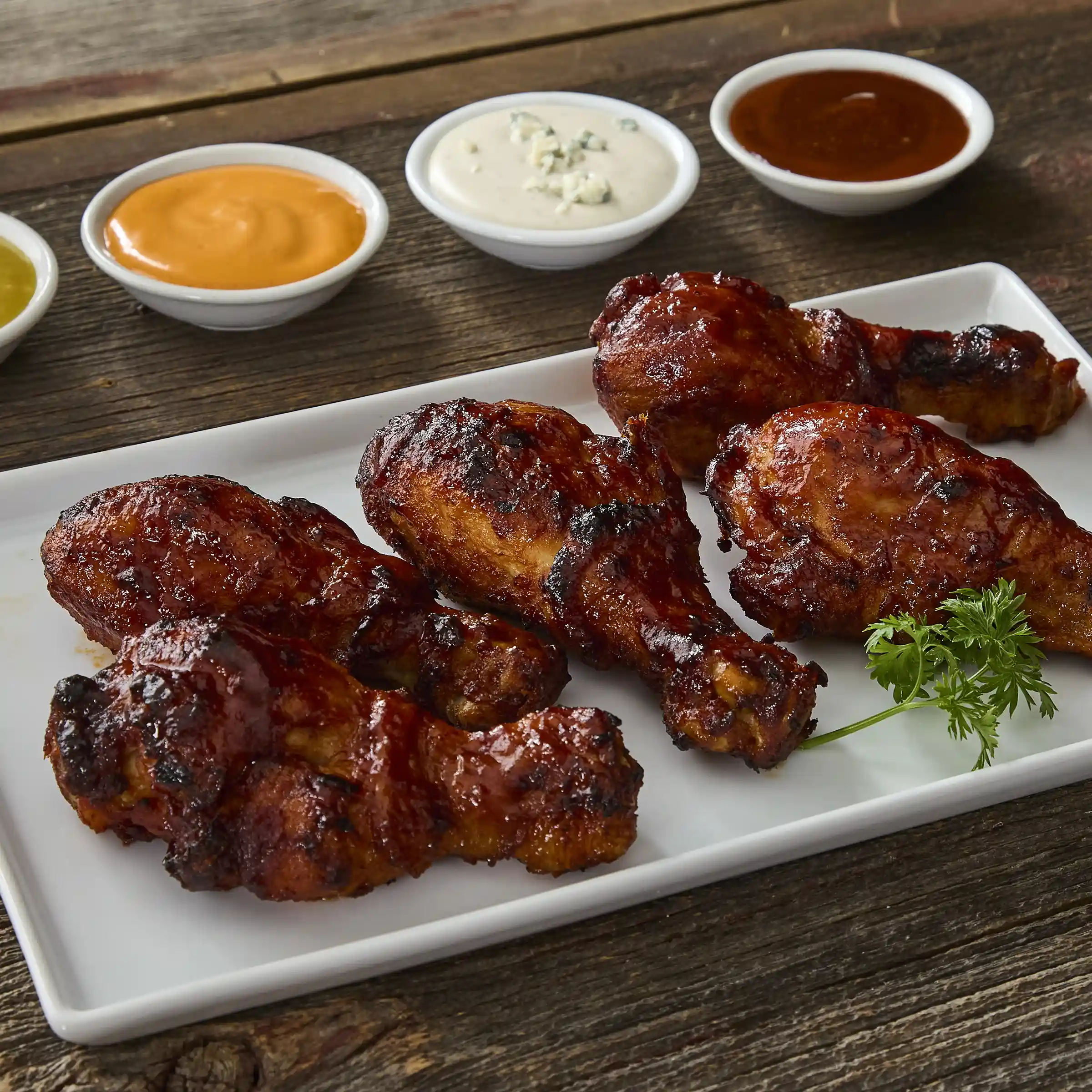 Tyson® Fully Cooked Hot BBQ Glazed Chicken Drumsticks https://images.salsify.com/image/upload/s--TD5SQDNy--/q_25/e5m4vljjiu5qzu3ynsqz.webp