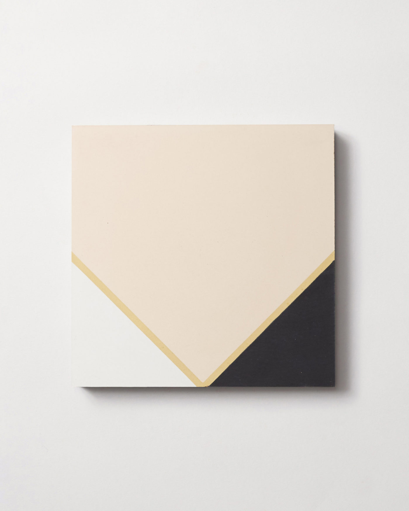 a beige and black square on a white background.