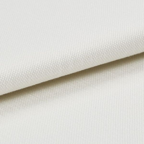 Cream-coloured textured canvas fabric, folded with one layer overlapping another, showing tight plain weave; photographed under soft studio lighting on a neutral background, close-up detail of surface.