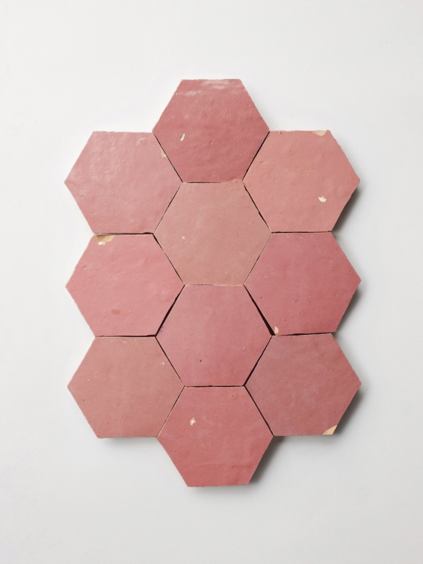 pink hexagon tiles on a white background.